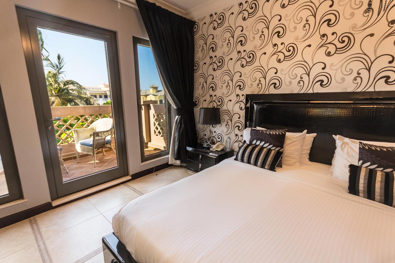 Yanjoon Holiday Homes - Palm Jumeirah Frond A Villas Dubaj Zewnętrze zdjęcie
